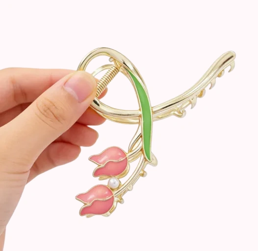 Pink Tulip Hair Claw · Hand View